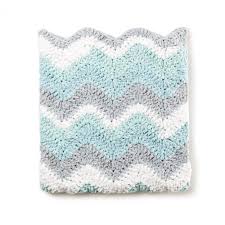 Stitch pattern is double moss (though its a bit hard to see, not aure if its just too early in the work or the yarn/color). Bernat Crochet Chevron Baby Blanket Pattern Yarnspirations