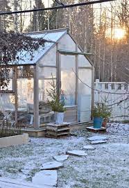 20 Small Greenhouses To Escape In Backyards Homemydesign Backyard Buildings Backyard Simple Greenhouse