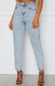 If you were to pair the jeans with a white shirt, for example, the light blue color would get washed out. What Goes Around Boyfriend Jeans Washed Blue Denim Boyfriend Jeans Light Color Jeans Trendy Jeans