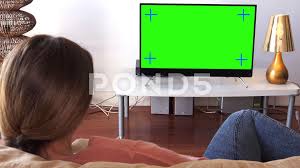 Zoom In Woman Watching Green Screen Television Lying On Couch Stock Footage Green Screen Watching Zoom Greenscreen Screen Girls Watches