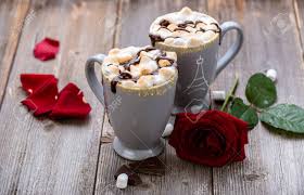 Pointed buds of deep rust unfurl to reveal a chocolate haze of velvety smoked tones that can even take on a purple hue. Smores Drink Two Mugs Of Hot Chocolate With Marshmallows On A Wooden Table Cocoa Rose Petals Valentine Stock Photo Picture And Royalty Free Image Image 70396463
