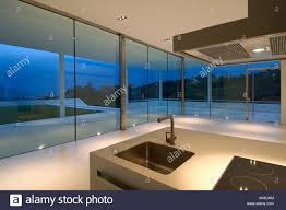 modern spanish kitchen with glass walls