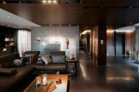 We love this #masculine living room with a modern edge using neutral greys, warm browns and metallics. 16 Brilliant Living Room Designs With Masculine Touch