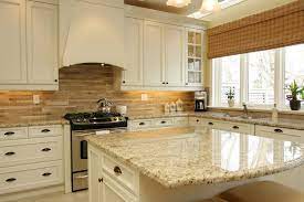 White kitchens with granite countertops. Giallo Ornamental Granite For Warm Elegant Kitchen Design Kitchen Design Elegant Kitchen Design Kitchen Cabinets And Backsplash