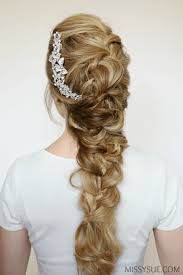 Braiding on the sides coupled with a bun on top creates a fabulous hairstyle without too much hassle. Fancy Formal Braid Missy Sue