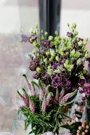 Download Premium Image Of Lisianthus And Pink Heather In A Flower Shop Blossoms Florist Flower Shop Ranunculus Flowers