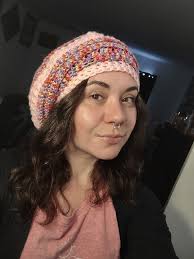 100 hats, scarves and ear warmers for donation in honor of my grandma.