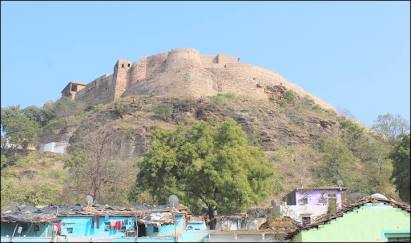 The historic Chanderi Fort overlooking the town, AI generated
