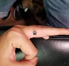 The web's most awesome small dog tattoos. 70 Best Paw Print Tattoo Ideas For Dog Lovers Page 10 Of 15 The Paws Small Finger Tattoos Cute Finger Tattoos Finger Tattoo Designs
