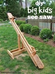 A Diy Tutorial To Build A Big Kids See Saw Make Your Own Backyard See Saw For Big Kids Using My Modifications Hinterhof Spielplatz Diy Hinterhof Hintergarten