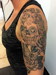 Sugar skull day of the dead tattoo sleeve. Tattoo Design Candy Skull Tattoo Best Sleeve Tattoos Half Sleeve Tattoo