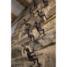 Welcome to eladitems where you will find the most original home decor items in the insurstry. Climbing Man Wall Sculpture You Ll Love In 2021 Visualhunt