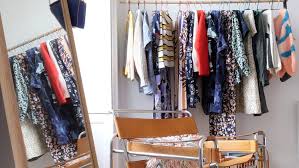 How to hang up your clothes on a drying rack inside and still have space to move! How To Create A Bedroom Closet With Clothing Racks Apartment Therapy
