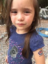 Hug a Cop Event Lieutenant Dohmann and Officer Becroft represented the  Stamford Police Department at the Hilton Hotel, which was stop number 35 of  a 50 state tour by 8 year old