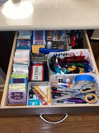 my organized chaos junk drawer in the
