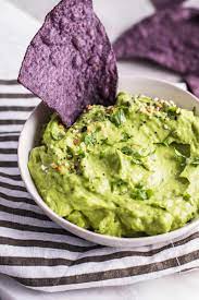 A little guacamole just makes life better. Easy Spicy Guacamole Recipe Healthy Fitness Meals