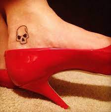 15 Awesome Skull Tattoo Designs With Best Pictures Skull Tattoo Designs Small Skull Tattoo Small Skull Tattoos