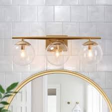 Light to shine on your bathroom mirror even when you don't have space for vanity lights. Uolfin Modern Brass Bathroom Vanity Light 3 Light Indoor Wall Sconce Bath Vanity Light With Clear Globe Glass Shades Q36nnbhd2359186 The Home Depot Modern Vanity Lighting Modern Bathroom Vanity Lighting Bathroom Light