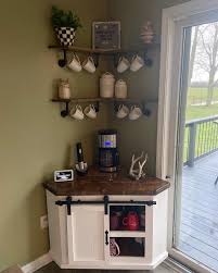 The dark stain on the wood in this coffee station idea lets the natural swirls in the wood show through, giving it a rustic look. The Top 78 Coffee Station Ideas