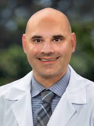 Dr. Adam Deising