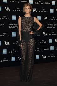 Poppy Delevingne flashes her nipples in black lace as she joins ...