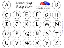 These free blank alphabet letter mats make look simple, but they are filled with possibility for your preschool classroom! Abc Bottle Cap Letter Mat This Reading Mama