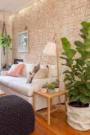 Incorporate a light backdrop to keep a room clad in dark. 77 Cool Living Rooms With Brick Walls Digsdigs