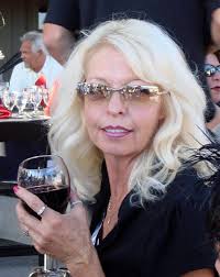 Can someone please help me edit this photo for a funeral? I need it done  asap and willing to pay if I have too. If we could clean up the glasses or