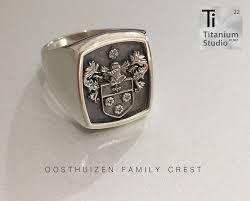 Black And White Coat Of Arms Of South Africa Oosthuizen Family Crest Ring Family Crest Rings Black Titanium Ring Titanium Rings