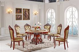It has a wooden dining table and white modern chairs guarded by a buddha sculpture on the side. Dining Room Furniture Dining Table Set Durable Dinning Table With 6 Chairs Dinning Table Dinning Table Chairtable Design Aliexpress