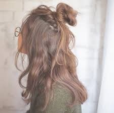 This style is so quick, so easy. 7 Ridiculously Easy Half Up Half Down Bun Ideas