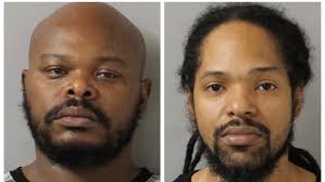 Two convicted felons arrested