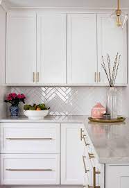 Right above the kitchen island is an accent ceiling design, with a recess the same size as the island, and decorative wooden beams. 75 Beautiful Craftsman White Kitchen Pictures Ideas July 2021 Houzz