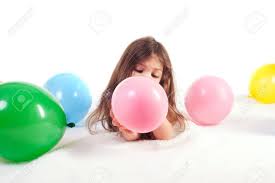 Keep the straw in the tab by pinching it in place while you blow into it to fill the balloon with air. Young Girl Blowing Up A Bunch Of Balloons Stock Photo Picture And Royalty Free Image Image 6540606