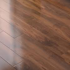 Dolce Natural Walnut Effect Laminate Flooring 0 04 M Sample Departments Diy At B Q Laminate Flooring Laminate Flooring Diy Flooring