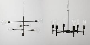 Available in two finishes, milk colored glass globes border a round metal ring, softly illuminating your livi… Which Chandelier For Eleanor S Room Making It Lovely