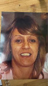 I wonder if anyone can help please? This is the most recent photo of my Mum  (and it's old), she has passed and I was wondering if it could be  brightened up