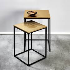 Use the console table as a sofa table and display your most beloved decorations. Akari Table Set Metal Poweder Coated Black Table Top Leave Gold 30x30 H 47 Cm 36x36 H 54 Cm