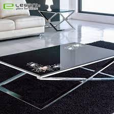 Modern coffee tables combine the utility of offering a flat surface to set coffee, tea, remotes, books and other living room items, while also ensuring exceptional style is on display in the space. Modern Stainless Steel Based Leg Black Top Glass Coffee Table China Coffee Tables Tables Made In China Com