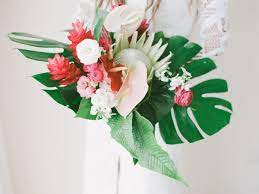 Orchids are known for their tropical look. 18 Striking Tropical Wedding Bouquets