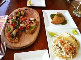Check spelling or type a new query. Flatbread Empanada And Fish Tacos Picture Of Rumfish Y Vino Placencia Tripadvisor
