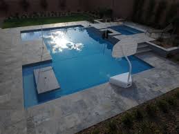 This Pool Has Great Fun In The Sun Options Spillover Spa Built In Table Benches Umbrella Sleeves Pole Holders For Volleybal Pool Bench Table Outdoor Decor