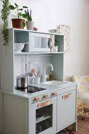 good free ikea hack how to revamp the duktig children s kitchen thoughts an ikea kids space continue ikea play kitchen ikea kids kitchen diy play kitchen
