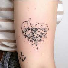 Aquarius The Water Bearer Gorgeous Zodiac Tattoos For The Astrology Obsessed Photos Aquarius Tattoo Body Art Tattoos Tattoos