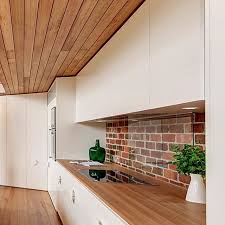 Exposed Brick And Glass Via Starrighthomes Brick Wall Kitchen Kitchen Splashback Tiles Modern Kitchen Interiors
