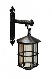 Cast in black iron with a warming copper inner, these decorative lanterns embrace industrial lighting chic. Antique Black Iron Wall Mounted Interior Lamp