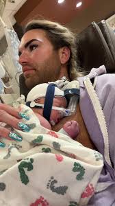 Getting to hold Dylan for the first time and of course he pees