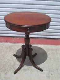 Whether using it as the perfect perch for a reading lamp or as the hub for living room electronics, end tables are a staple in our homes. American Antique Round Side Table Lamp Table Stand Antique Furniture 20 Round 24 High Antique Table Furniture Table