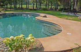 If you like the durability but prefer more cool patio pool surfaces, consider using stamped or colored concrete to add more. Boccella Concrete Kool Deck Cool Deck Deck Railing Pictures