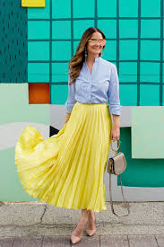 Black And Yellow Pleated Skirt Yellow Satin Pleated Skirt With A Navy Wool Blazer Yellow Skirt Outfits Yellow Pleated Skirt Pleats Fashion